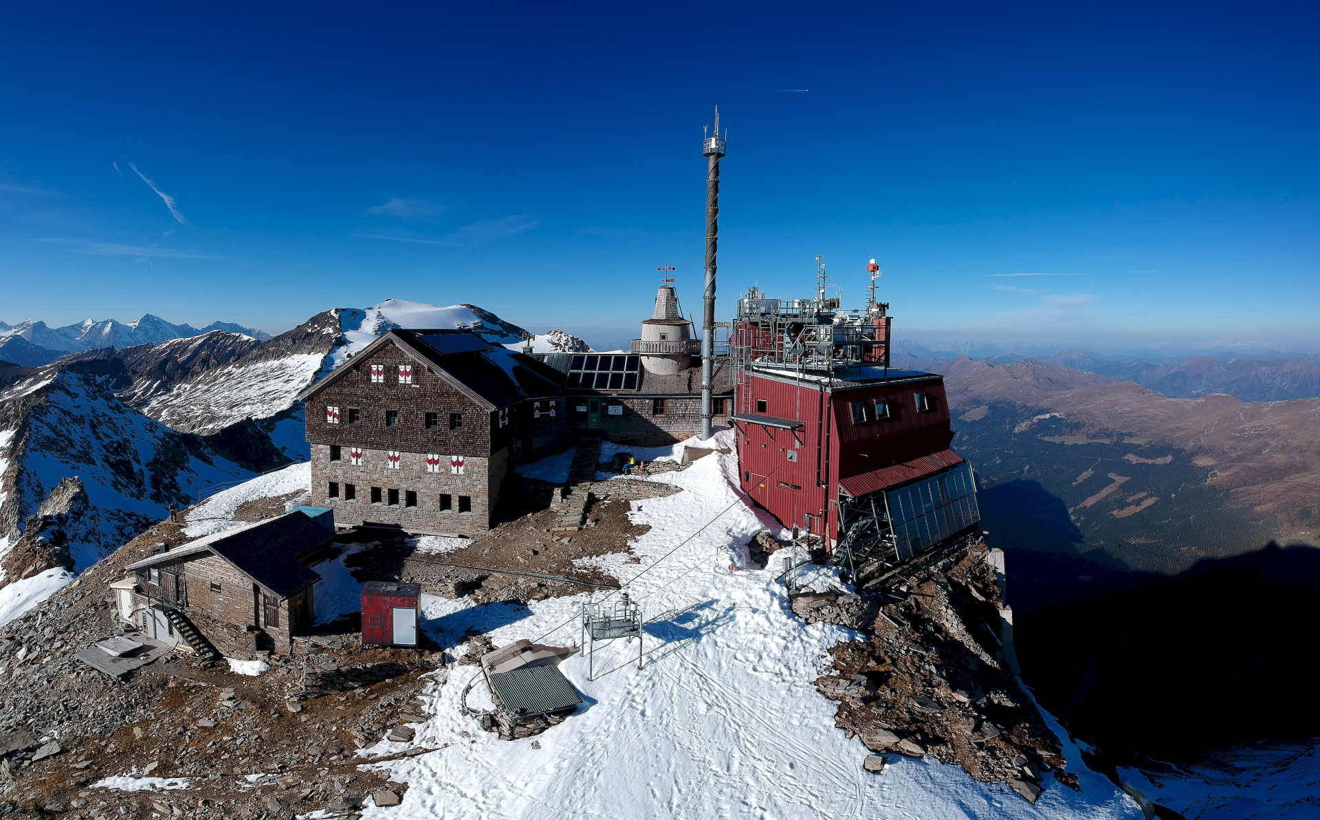 Building complex with antenna mast.